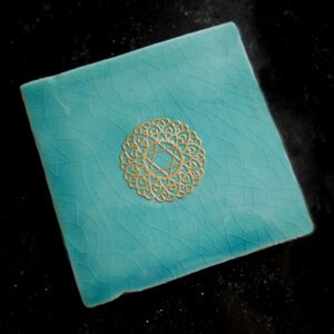 Onderzetter met krachtsymbool